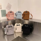 Compact corduroy crossbody bag