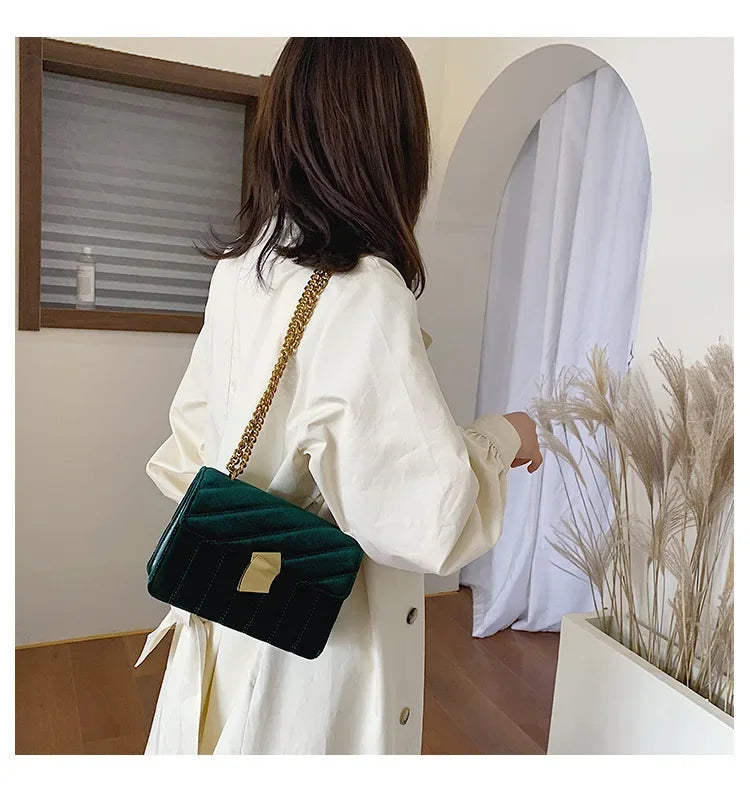 Corduroy handbag with chain and flap closure