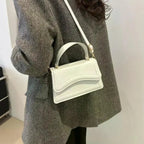 Elegant small leather crossbody bag