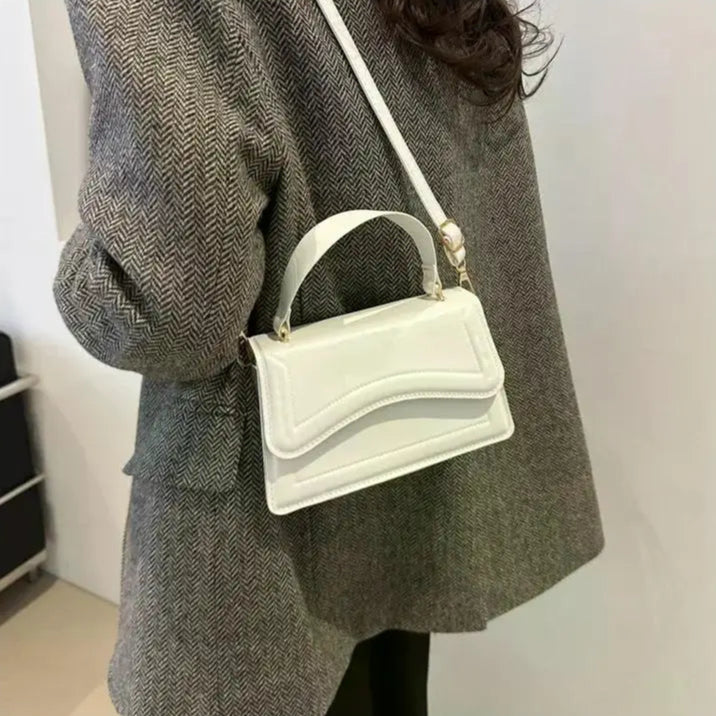 Elegant small leather crossbody bag