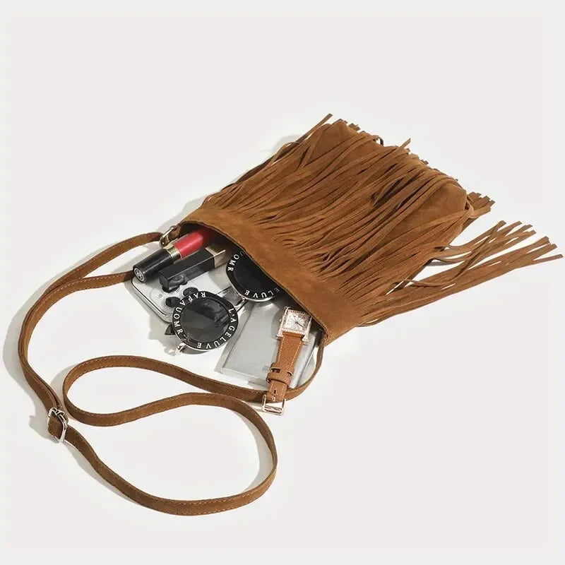 Classic suede shoulder bag with soft silhouette