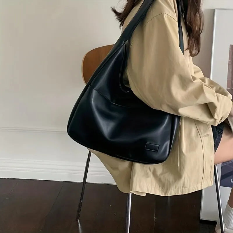 Women's black leather hobo bag
