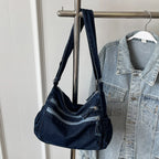 Classic denim shoulder handbag with zipper closure