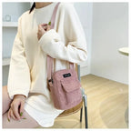 Corduroy crossbody handbag with front pocket