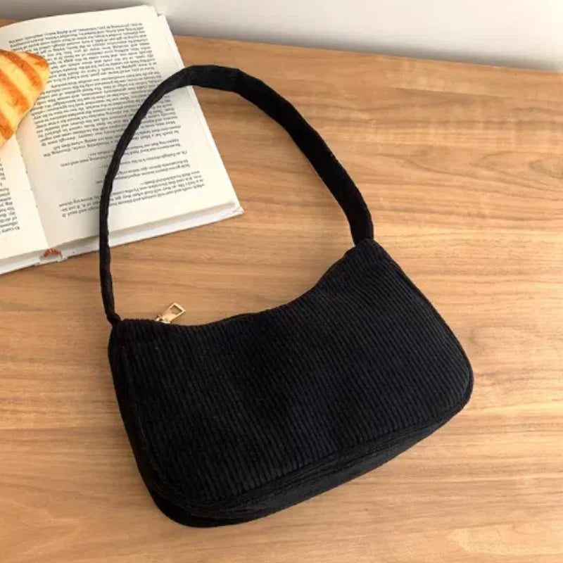 Soft corduroy handbag with single strap