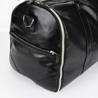 Elegant leather holdall with shoulder strap