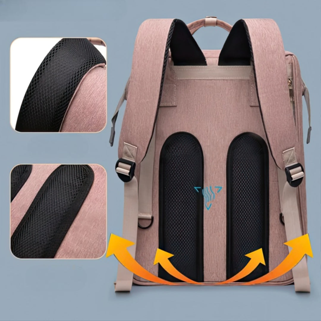 Pink diaper backpack with built-in bed