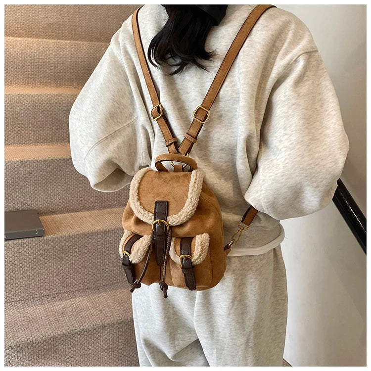 Suede backpack with front pockets