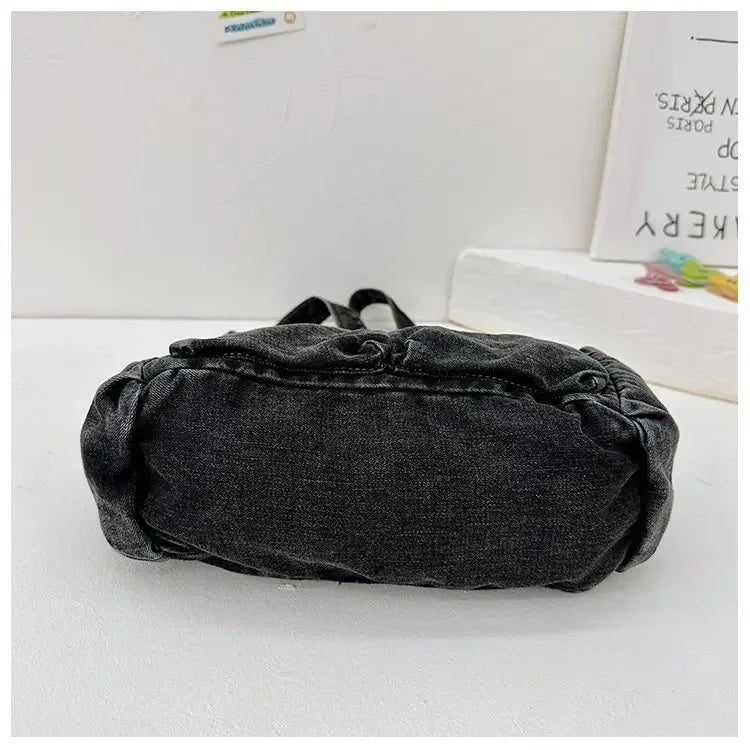 Denim top-handle handbag