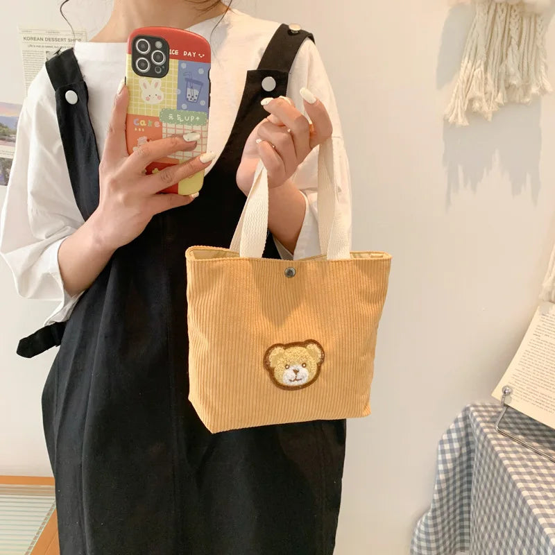 Women’s corduroy shoulder tote bag with front patch