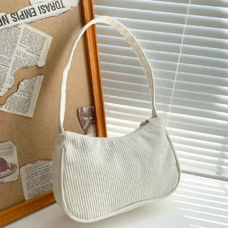 Soft corduroy handbag with single strap
