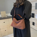 Suede shoulder handbag