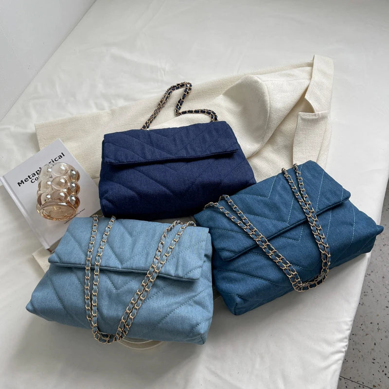 Flap-style denim shoulder handbag