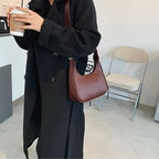 Minimalist leather shoulder bag for women