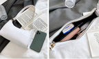 Small leather sling pouch