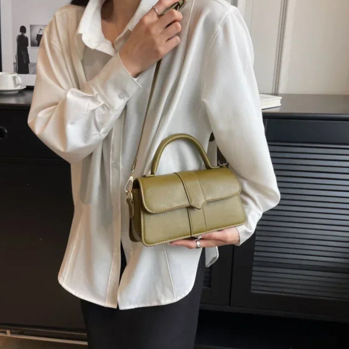 Compact leather sling bag for daily essentials