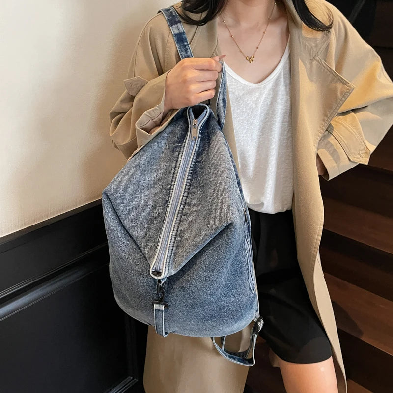 Washed denim backpack with adjustable straps