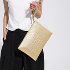 Crocodile texture leather clutch bag