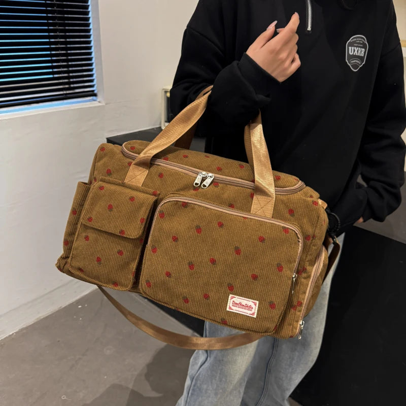 Corduroy travel toiletry bag with shoulder strap