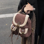 Suede backpack with front pockets