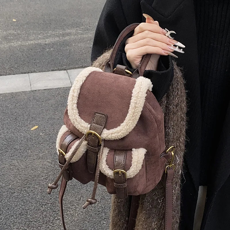 Suede backpack with front pockets