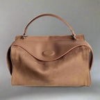 Suede handbag with subtle colors