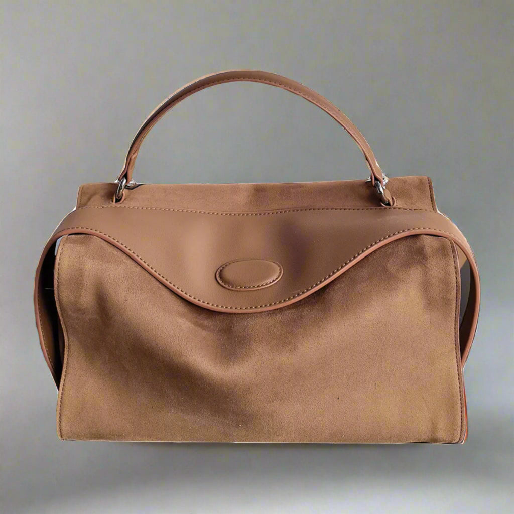 Suede handbag with subtle colors