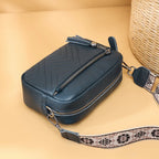 Textured leather crossbody bag