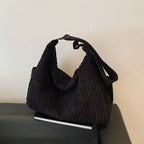 Versatile corduroy handbag with shoulder strap