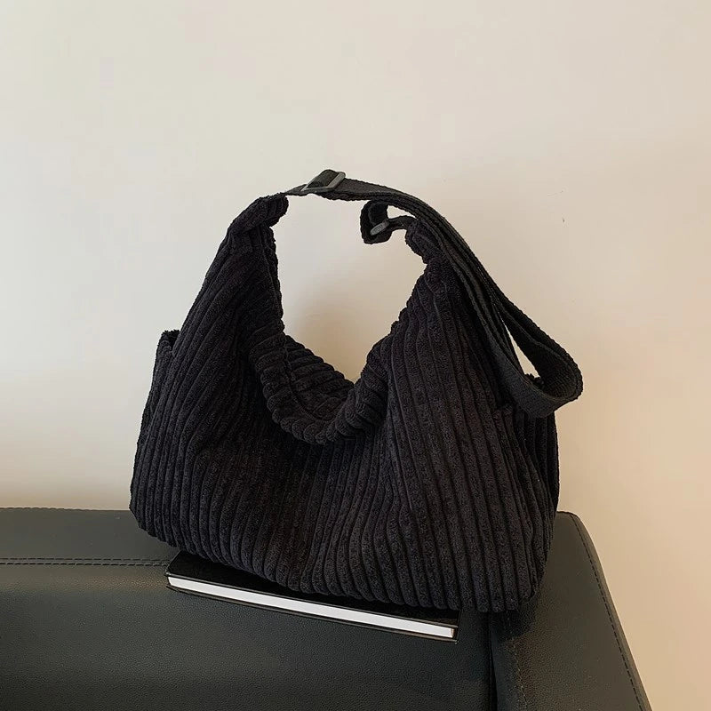 Versatile corduroy handbag with shoulder strap