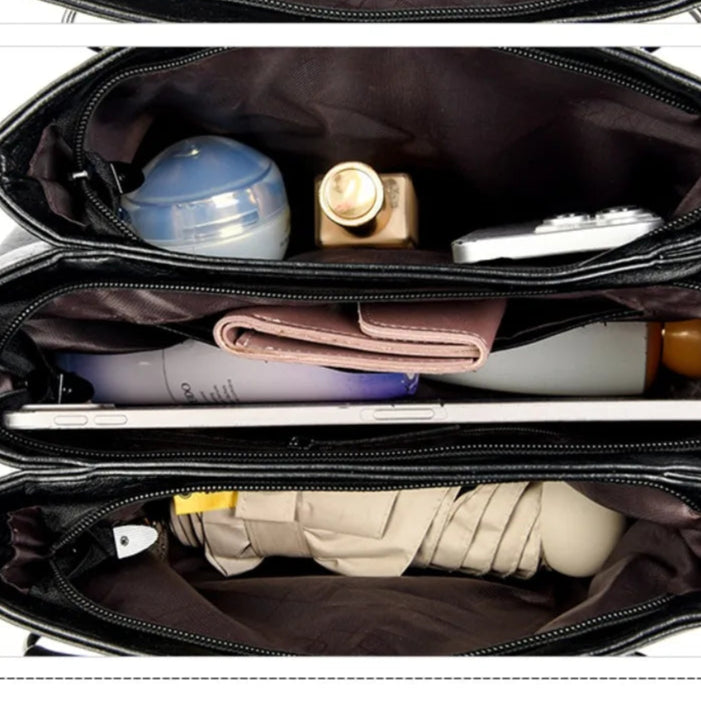 Leather handbag with detachable shoulder strap