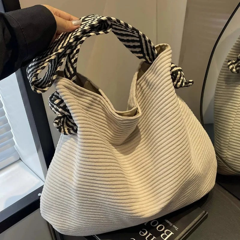 Corduroy handbag with wide shoulder strap
