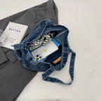 Fashion denim tote bag with leather patch