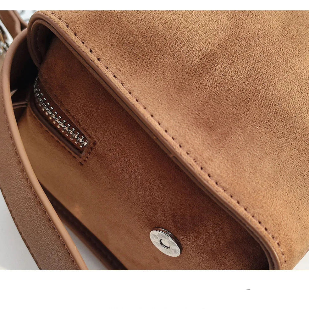 Suede handbag with subtle colors