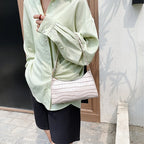Small leather sling pouch