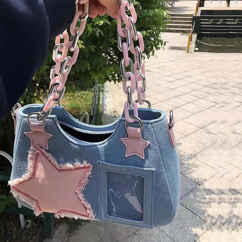 Denim handbag with star patches