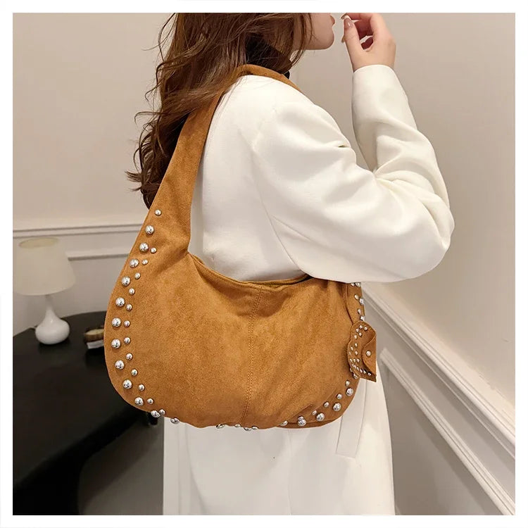Chic suede shoulder bag with decorative strass