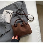 Everyday suede handbag with strap