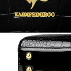 Soft leather handbag with curved top edge