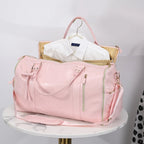Elegant leather holdall with shoulder strap