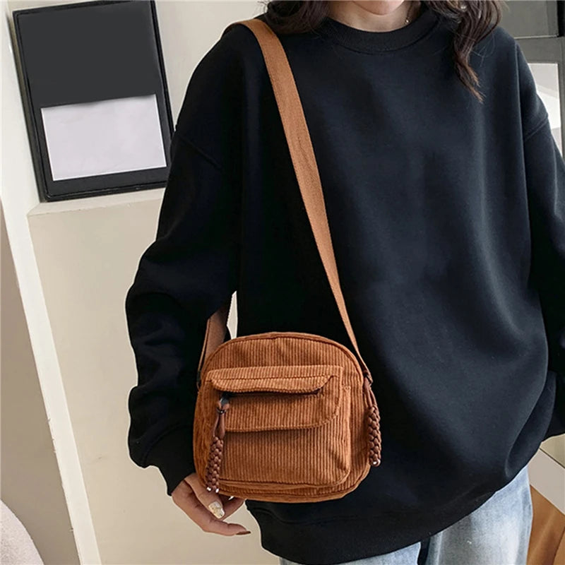 Small corduroy handbag with front zipper pocket
