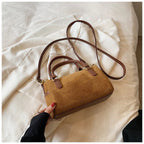 High-end suede purse with structured body