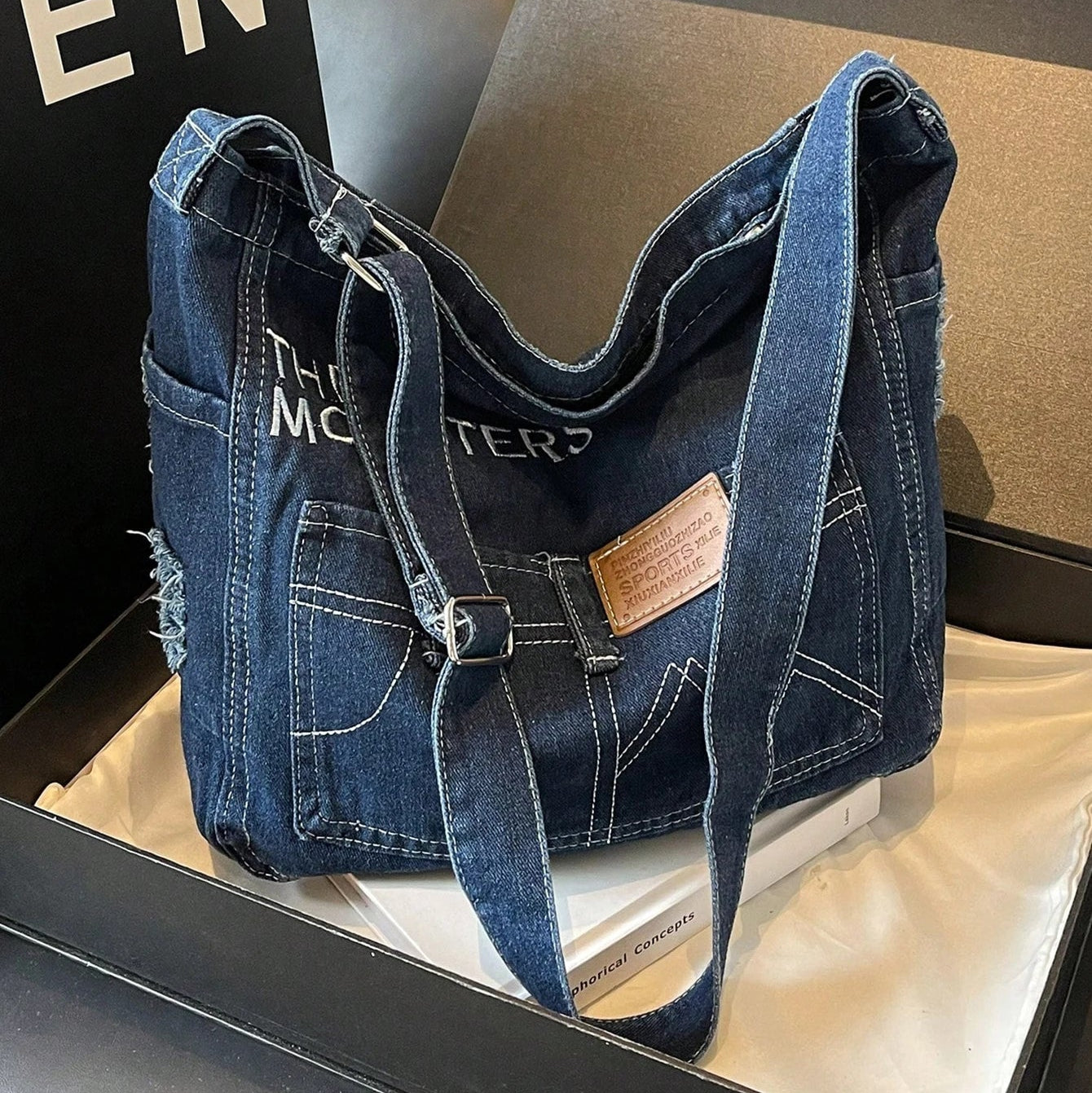 Distressed denim tote bag