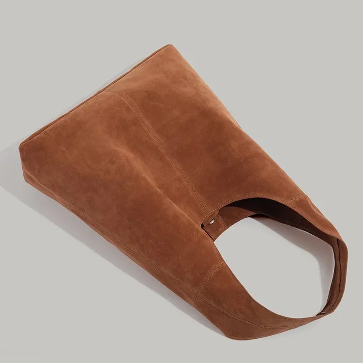 Suede hobo slouch bag with wide handle strap