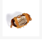 Designer-inspired suede handbag