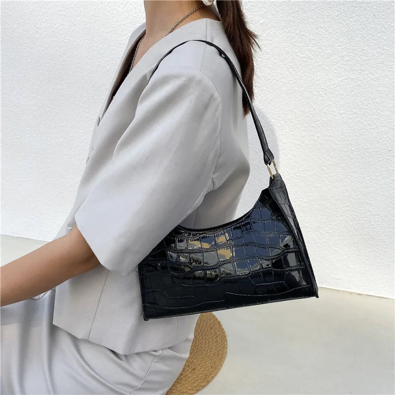 Small leather sling pouch