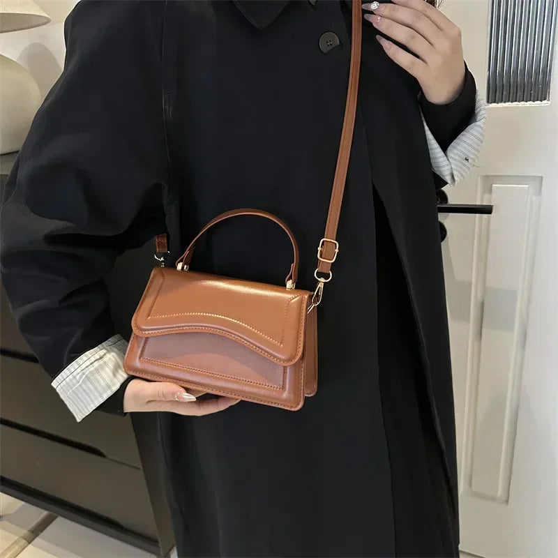 Elegant small leather crossbody bag
