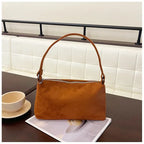Structured suede shoulder bag