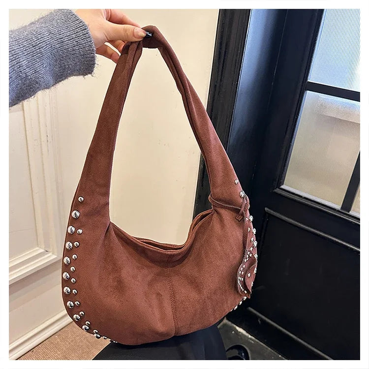 Chic suede shoulder bag with decorative strass