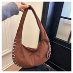 Chic suede shoulder bag with decorative strass